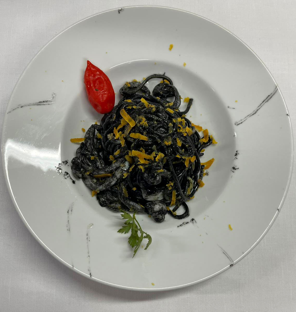 Chitarra al nero di seppia e bottarga